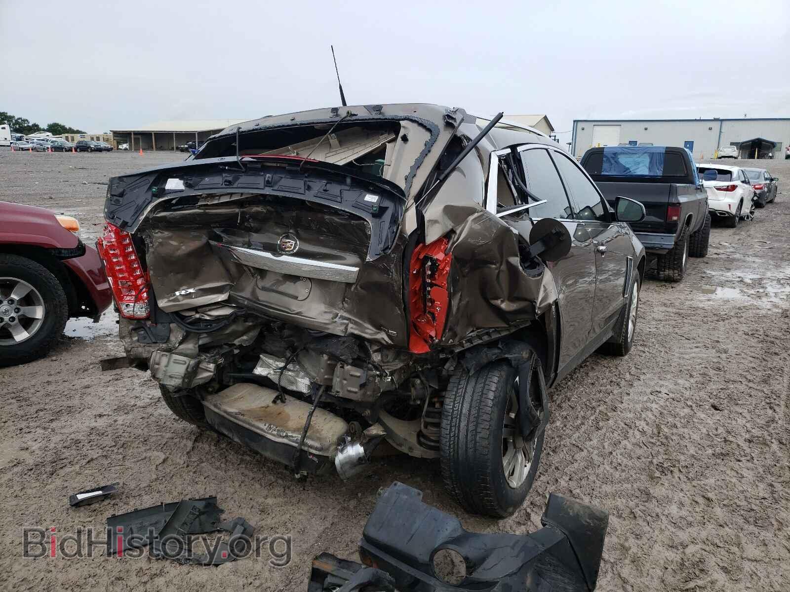 2014 CADILLAC SRX - VIN: 3GYFNBE36ES549058 - Фото 4