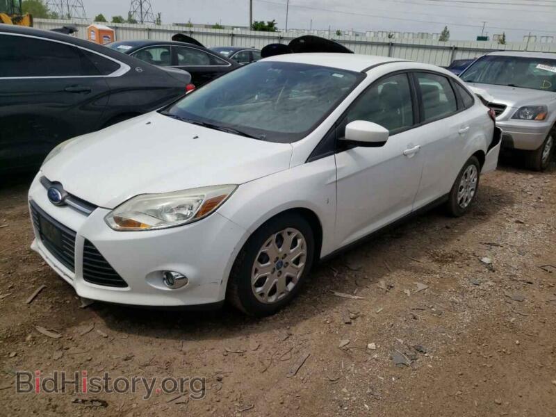 2012 Ford FOCUS SE (VIN 1FAHP3F24CL272584) — photo 1 of 12, Copart, damage: rear end