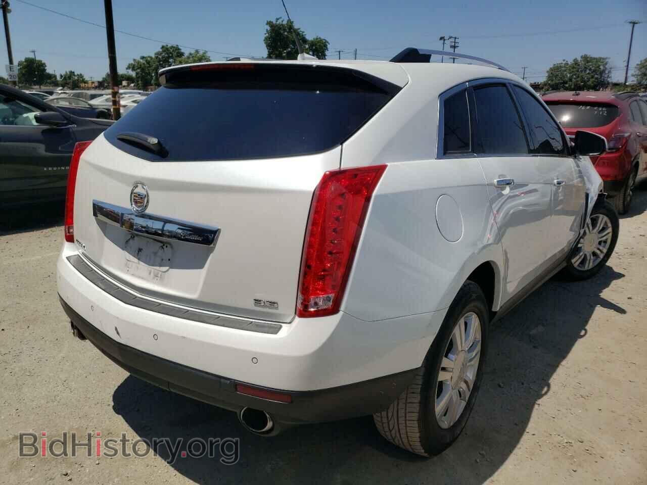 2013 CADILLAC SRX - VIN: 3GYFNCE33DS649946 - Фото 4