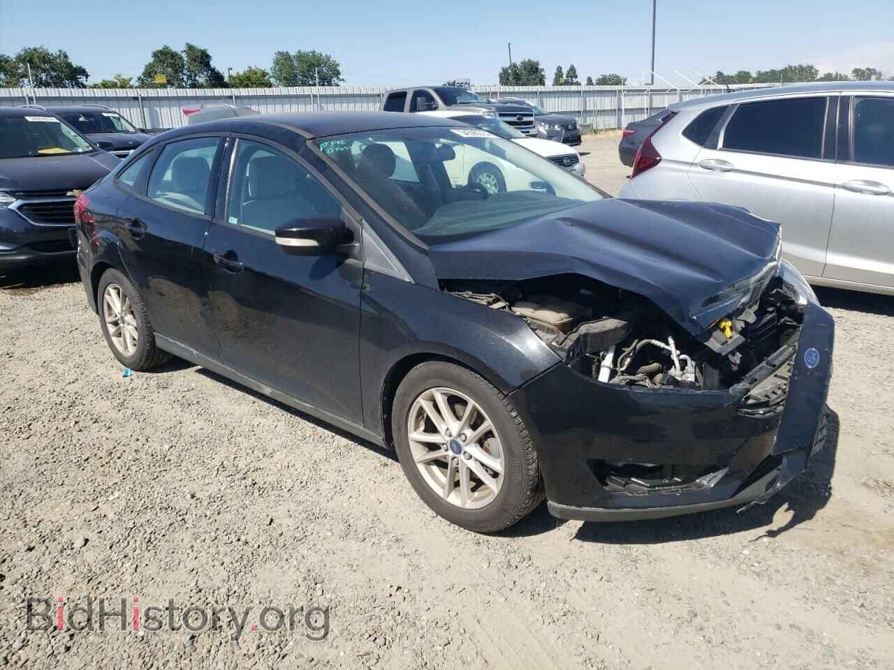 2015 FORD FOCUS - VIN: 1FADP3F20FL221991 - Photo 4