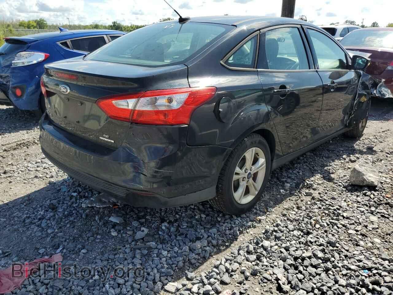 2014 FORD FOCUS - VIN: 1FADP3F20EL435460 - Photo 4