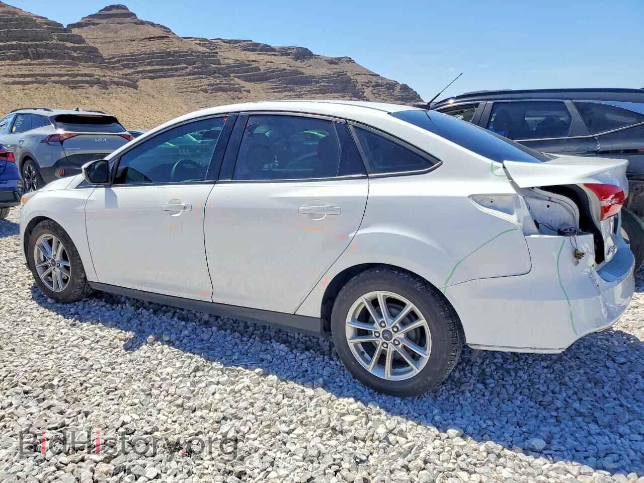 2016 FORD FOCUS - VIN: 1FADP3F29GL268230 - Фото 2