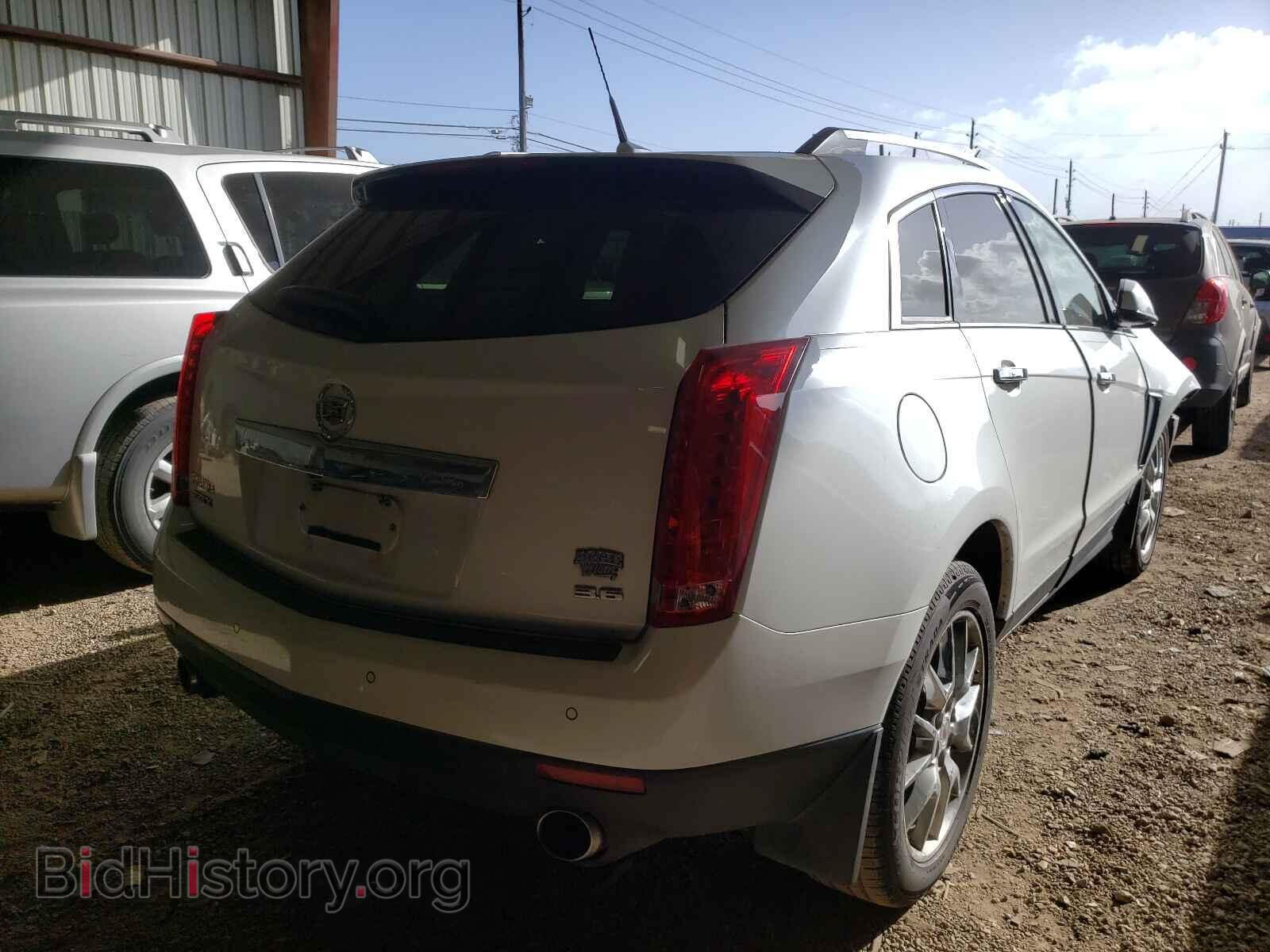 2014 CADILLAC SRX - VIN: 3GYFNDE3XES549902 - Фото 4
