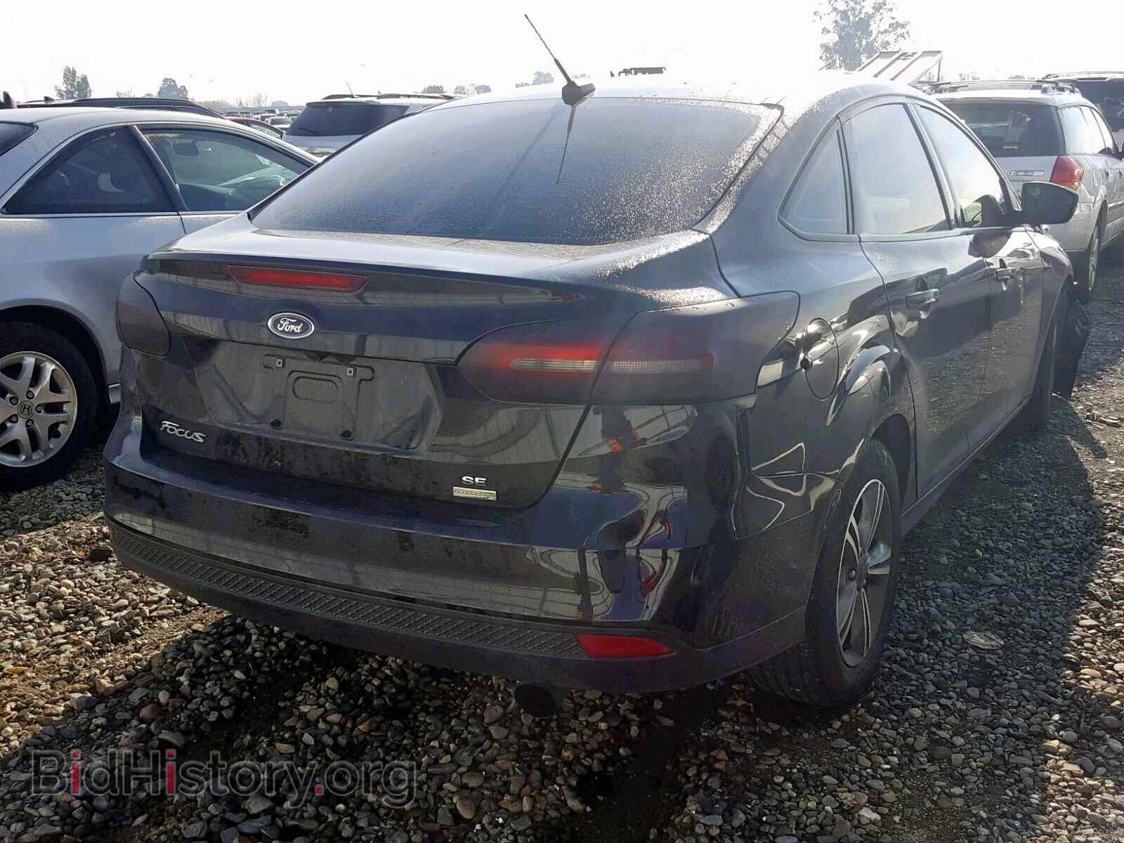 2017 FORD FOCUS - VIN: 1FADP3FE0HL277832 - Photo 4