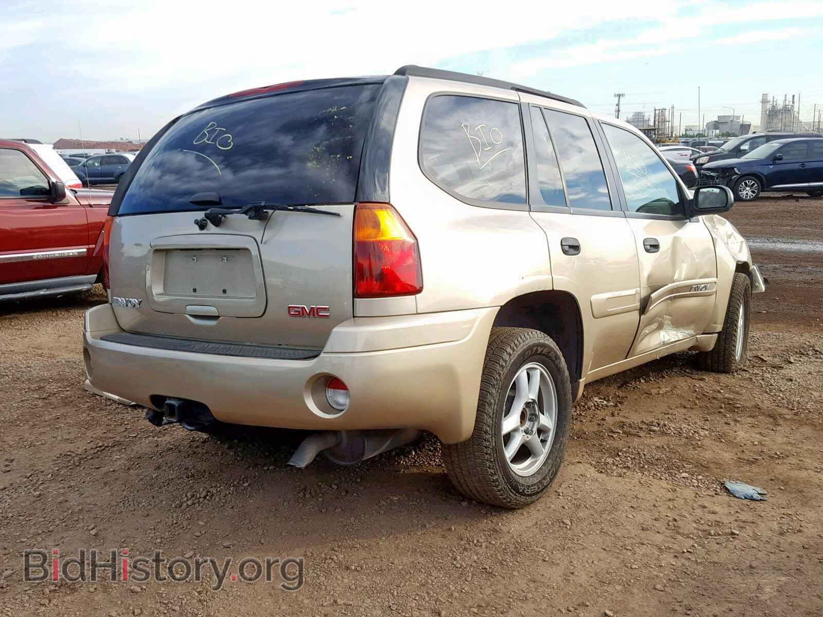 2004 GMC ENVOY - VIN: 1GKDS13S542425792 - Photo 4