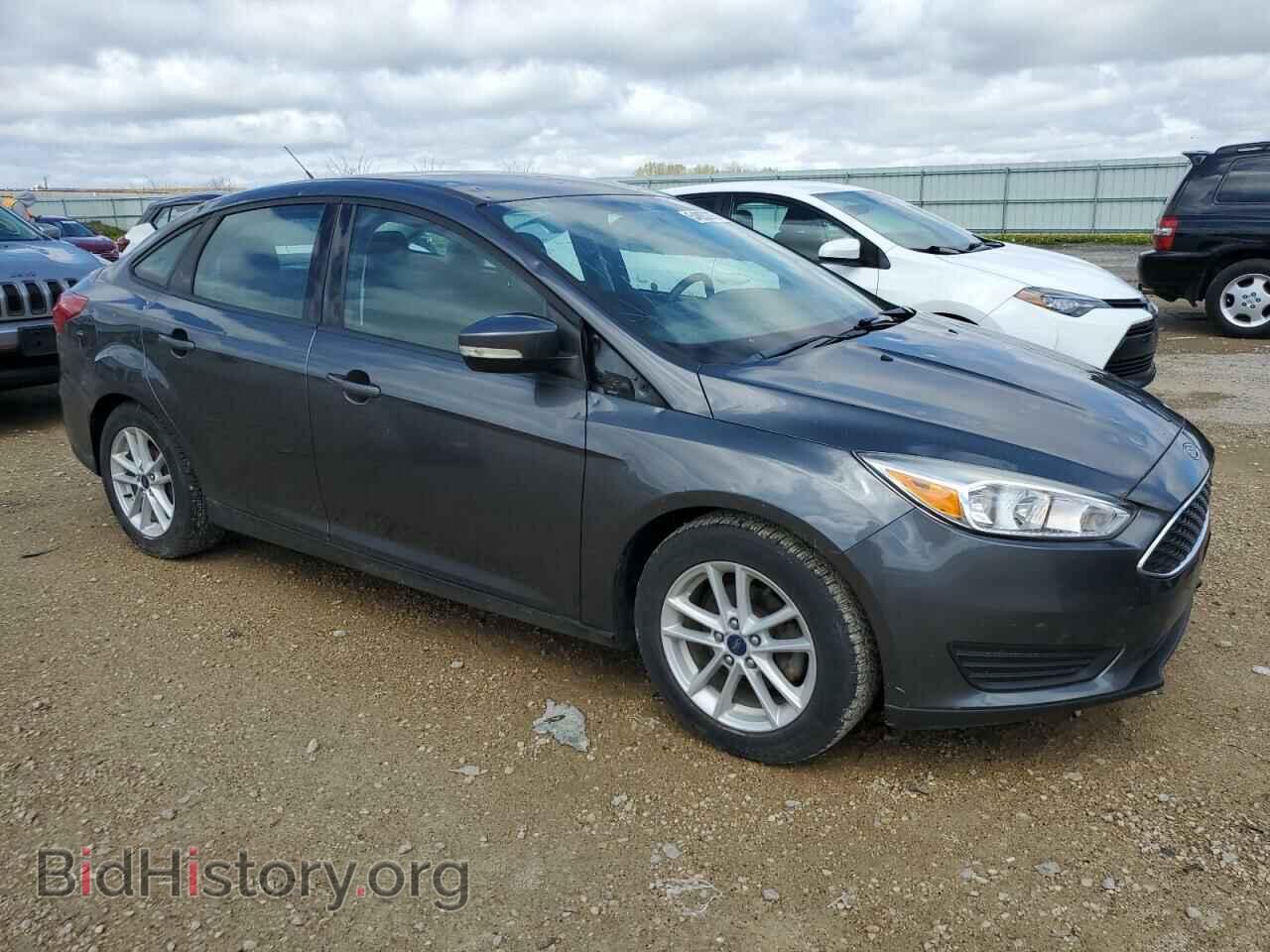 2017 FORD FOCUS - VIN: 1FADP3F25HL228597 - Photo 4