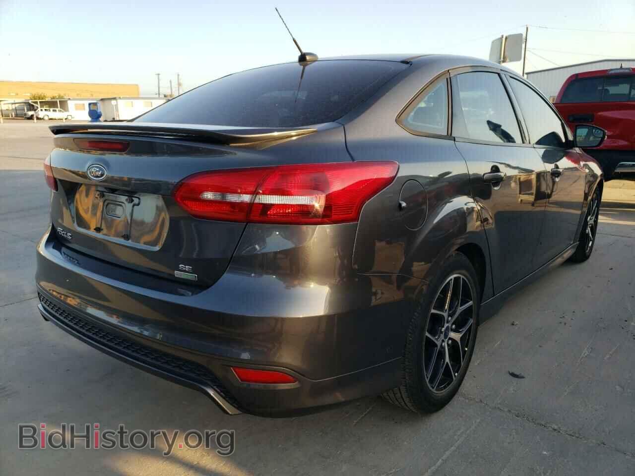 2015 FORD FOCUS - VIN: 1FADP3FE9FL379823 - Photo 4