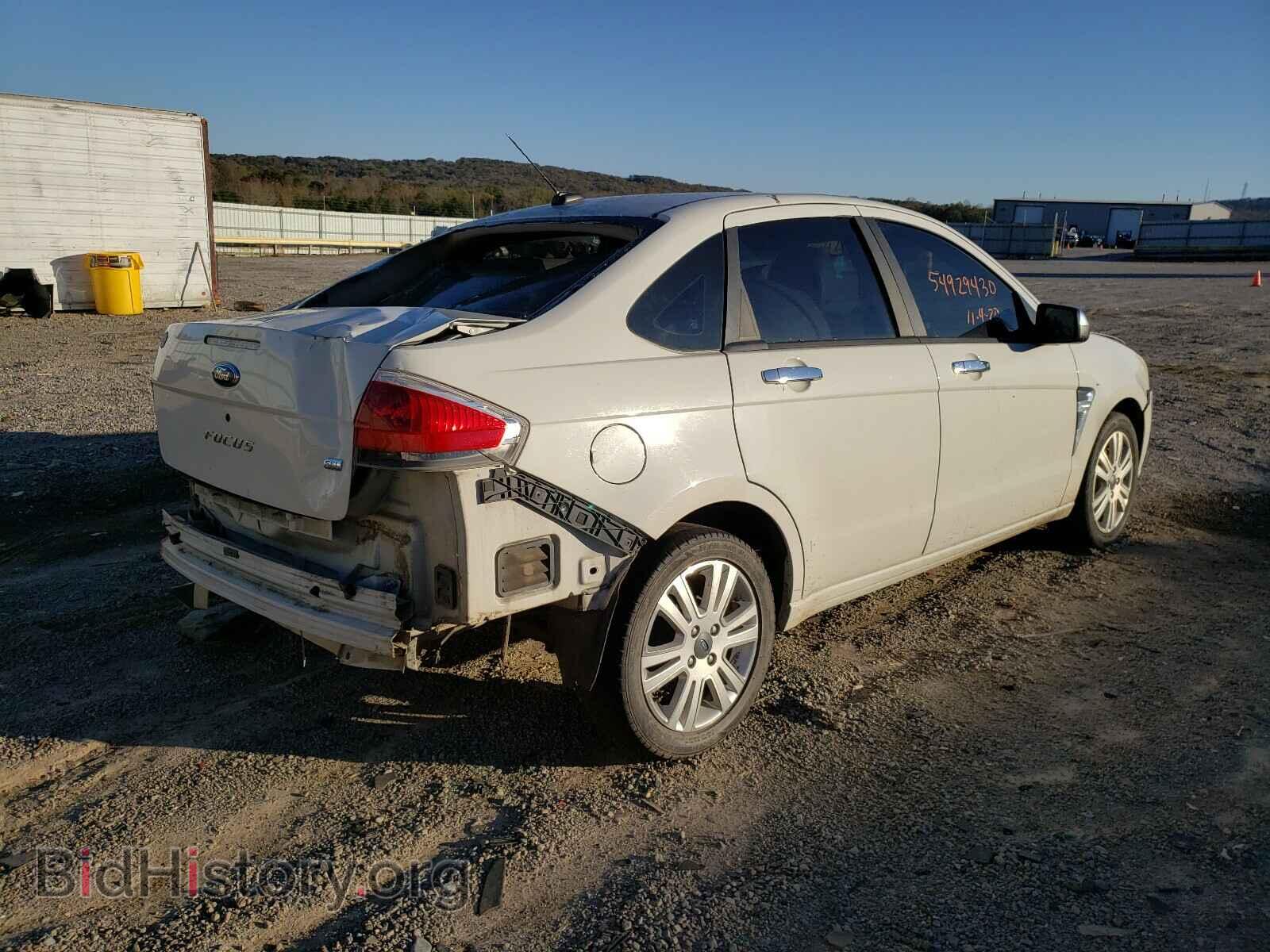 2009 FORD FOCUS - VIN: 1FAHP37N09W134847 - Photo 4