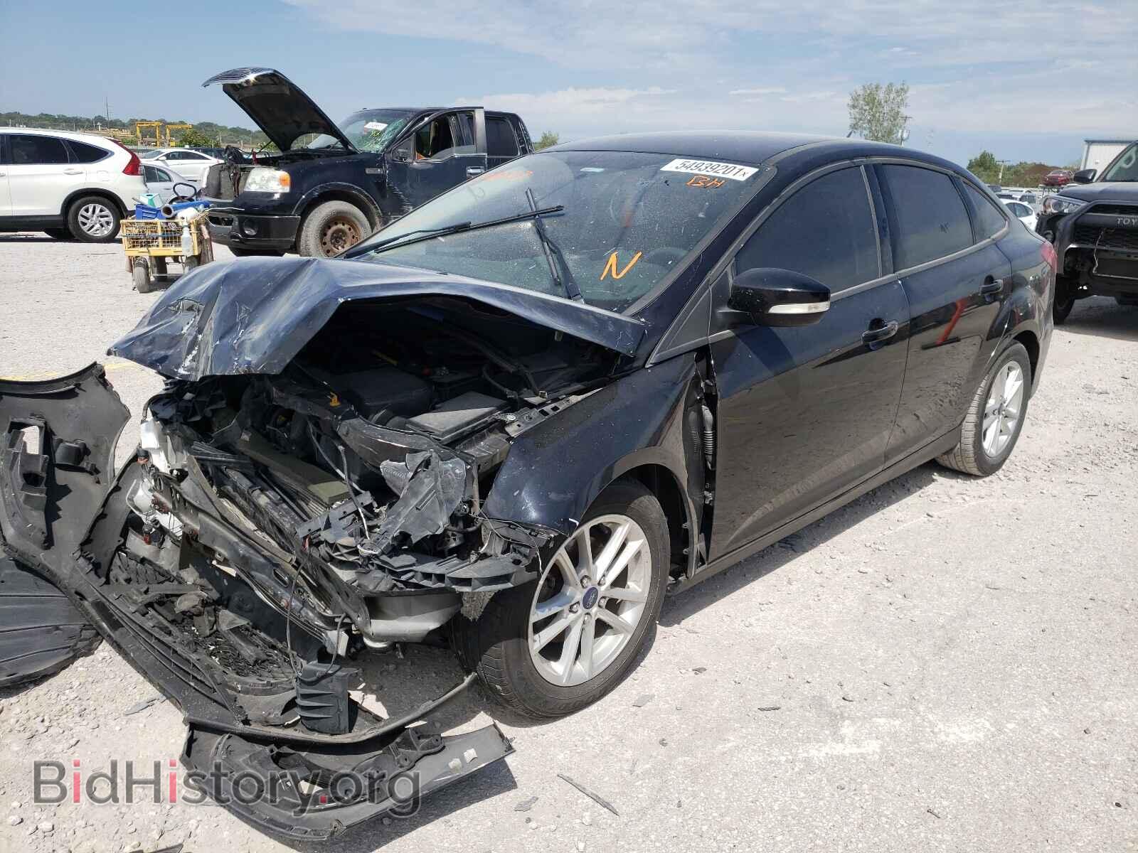 2016 FORD FOCUS - VIN: 1FADP3F27GL208897 - Фото 2