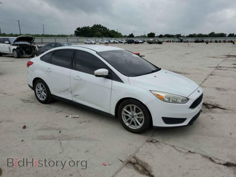 2015 Ford FOCUS (VIN 1FADP3F26FL351077) — фото 4 из 12
