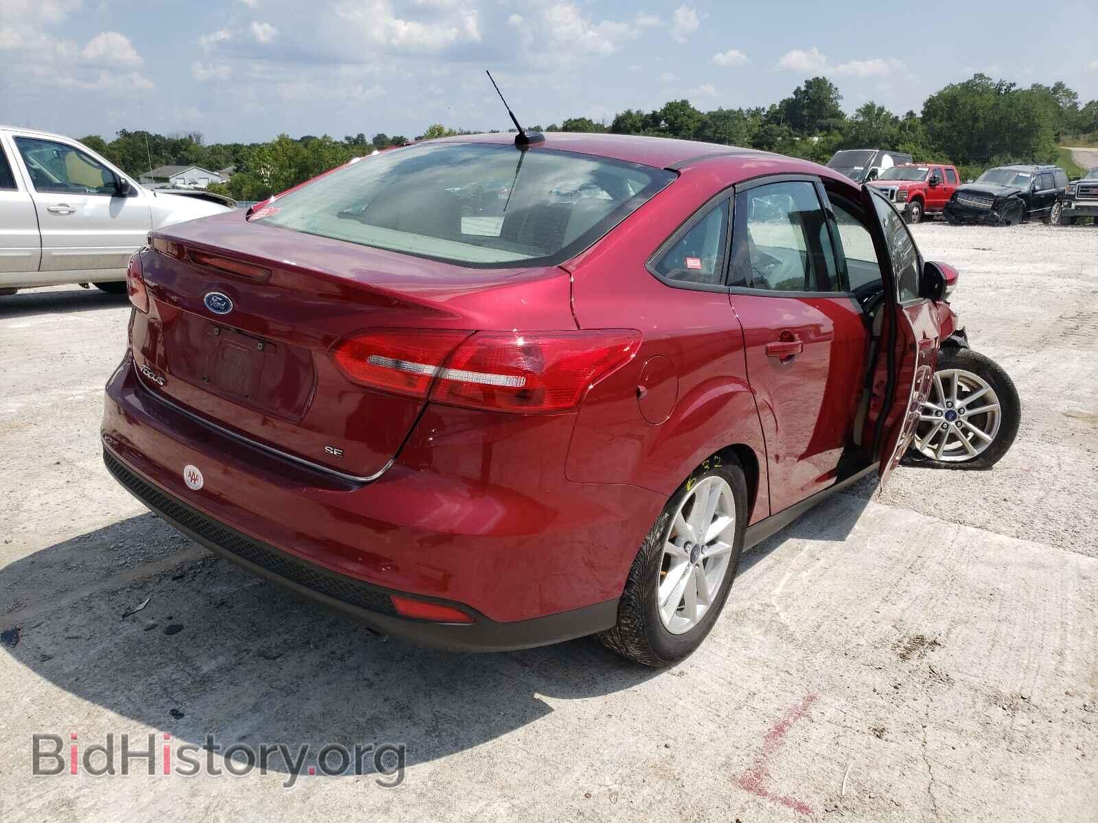 2017 FORD FOCUS - VIN: 1FADP3F29HL221913 - Photo 4