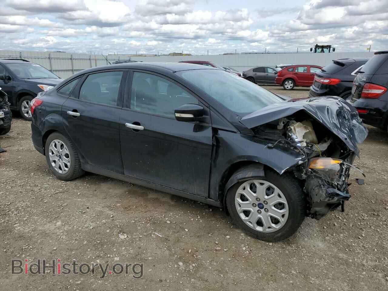 2014 FORD FOCUS - VIN: 1FADP3F21EL335271 - Photo 4
