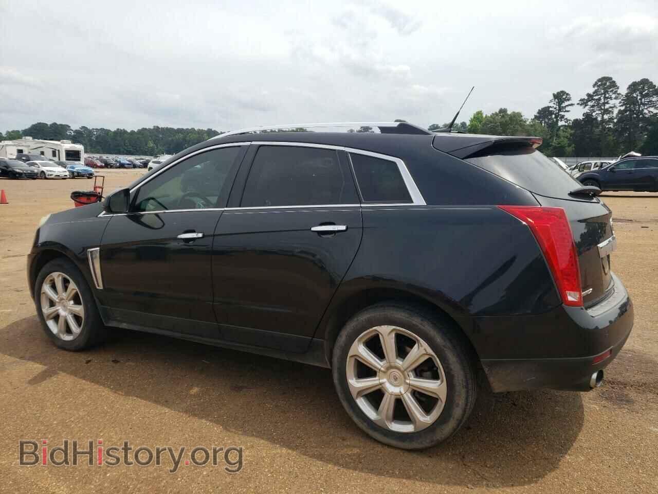 2014 CADILLAC SRX - VIN: 3GYFNCE38ES525883 - Фото 2