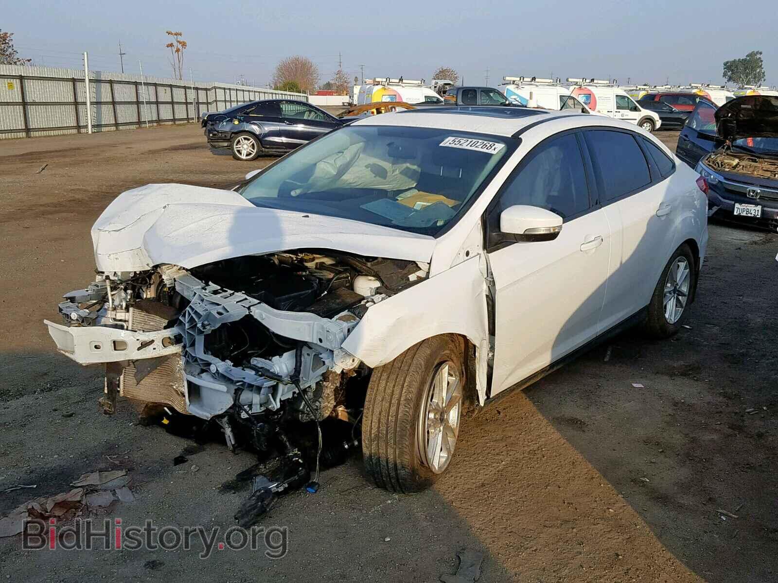 2016 FORD FOCUS - VIN: 1FADP3F29GL399285 - Фото 2