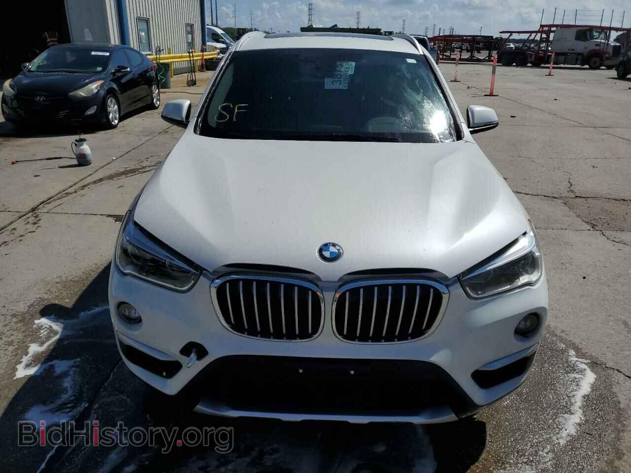 2018 BMW X1 - VIN: WBXHT3C31J5F89877 - Фото 5