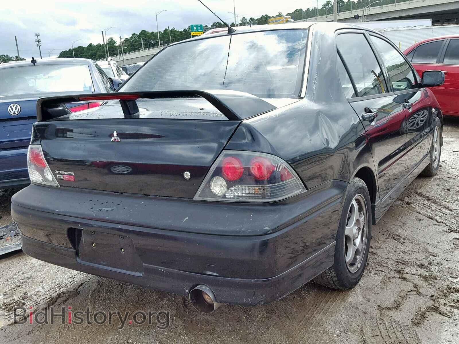 2002 MITSUBISHI LANCER - VIN: JA3AJ86E62U042749 - Photo 4