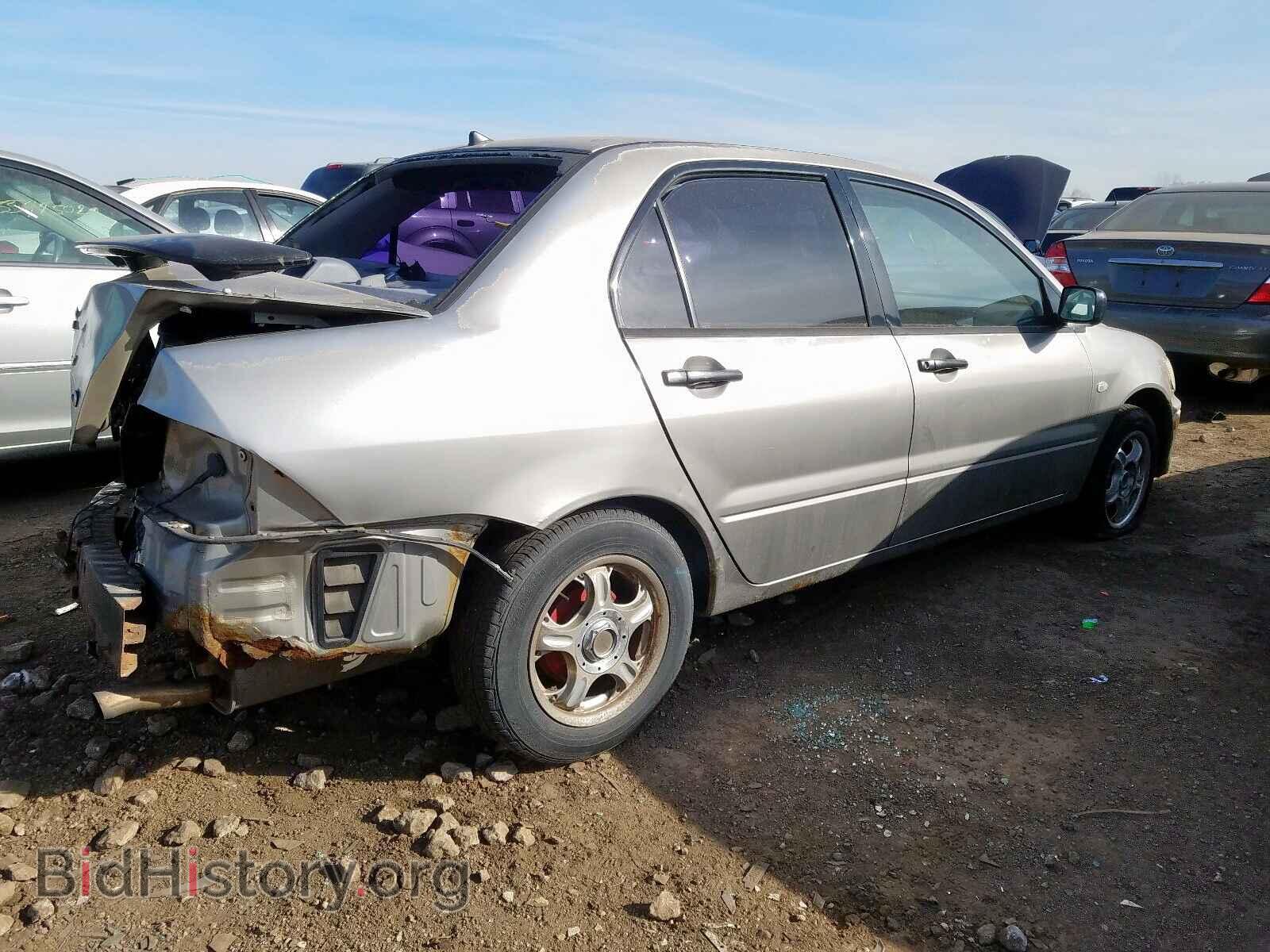 2002 MITSUBISHI LANCER - VIN: JA3AJ26EX2U009024 - Photo 4