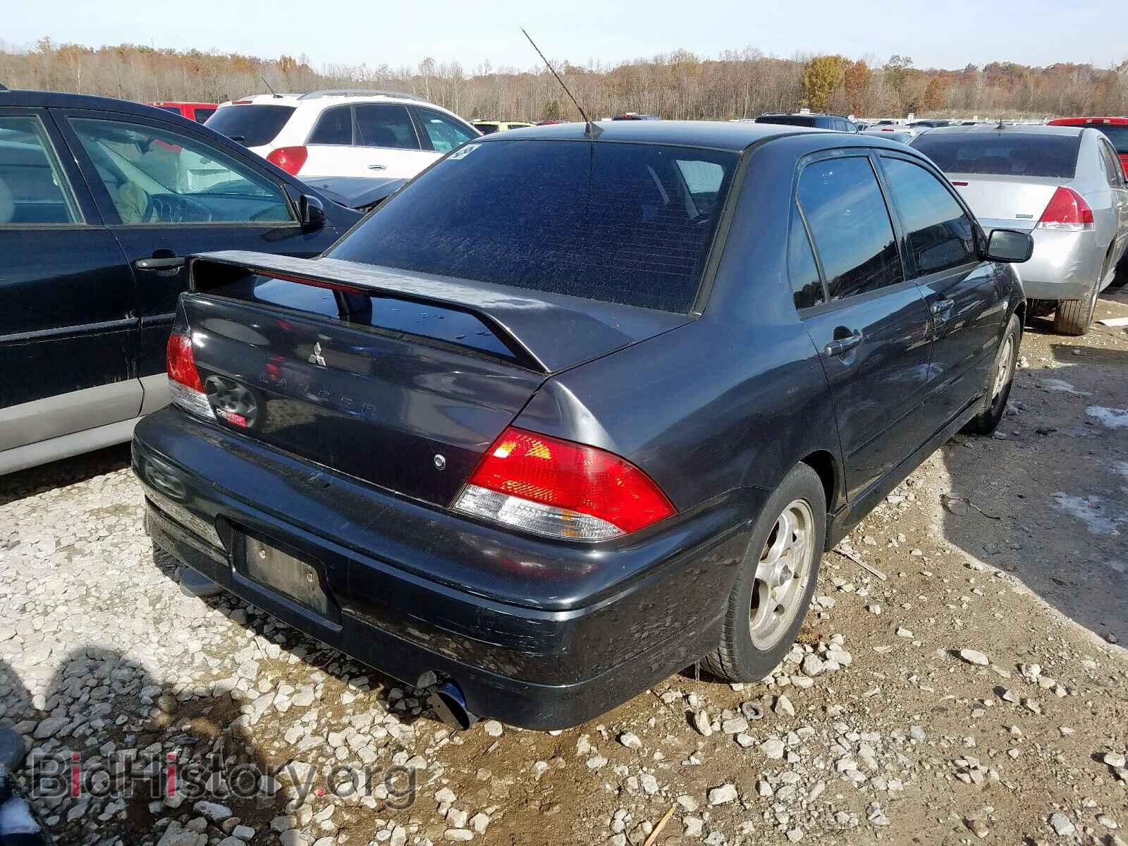 2002 MITSUBISHI LANCER - VIN: JA3AJ86E12U036888 - Photo 4