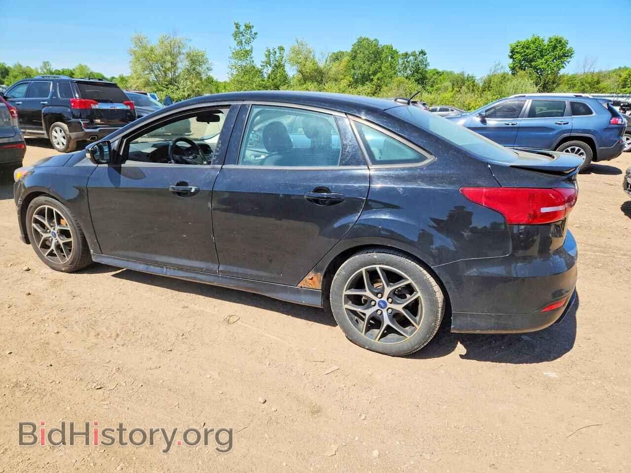 2016 FORD FOCUS - VIN: 1FADP3F21GL207969 - Photo 2