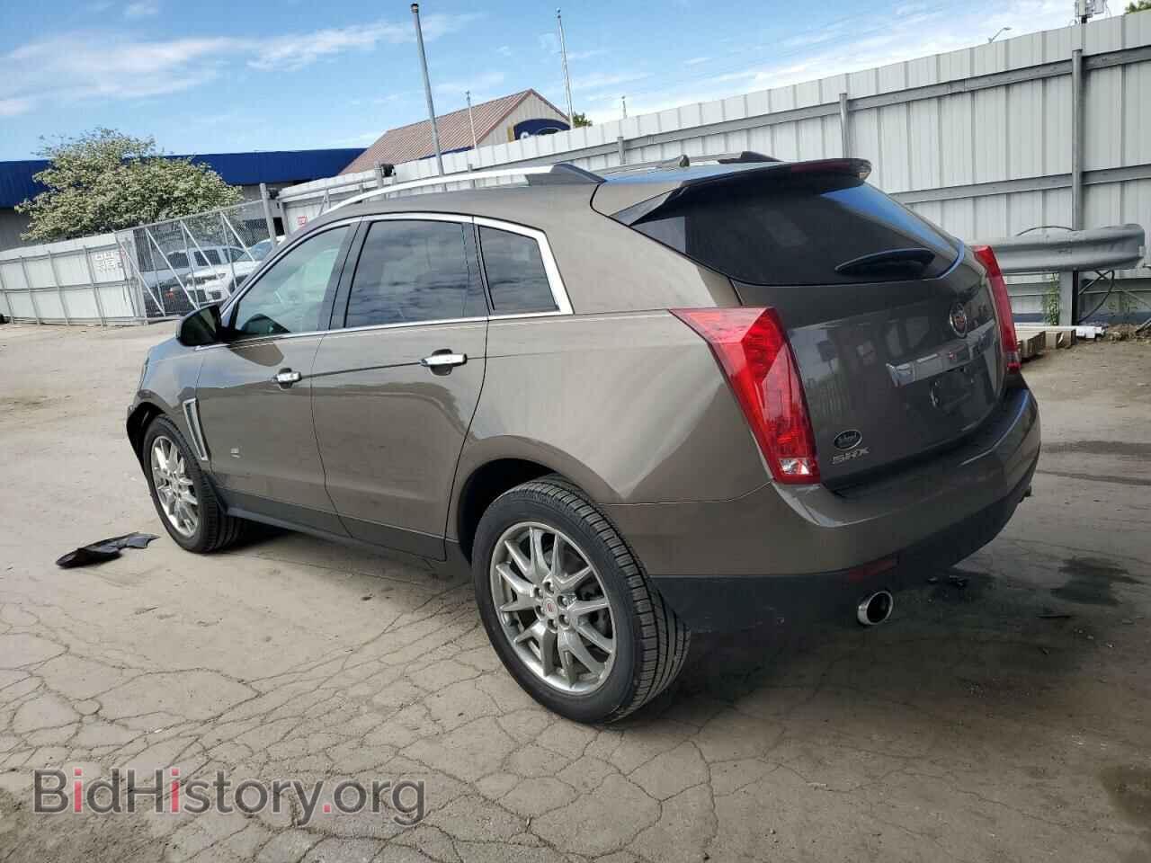 2014 CADILLAC SRX - VIN: 3GYFNCE30ES547909 - Фото 2