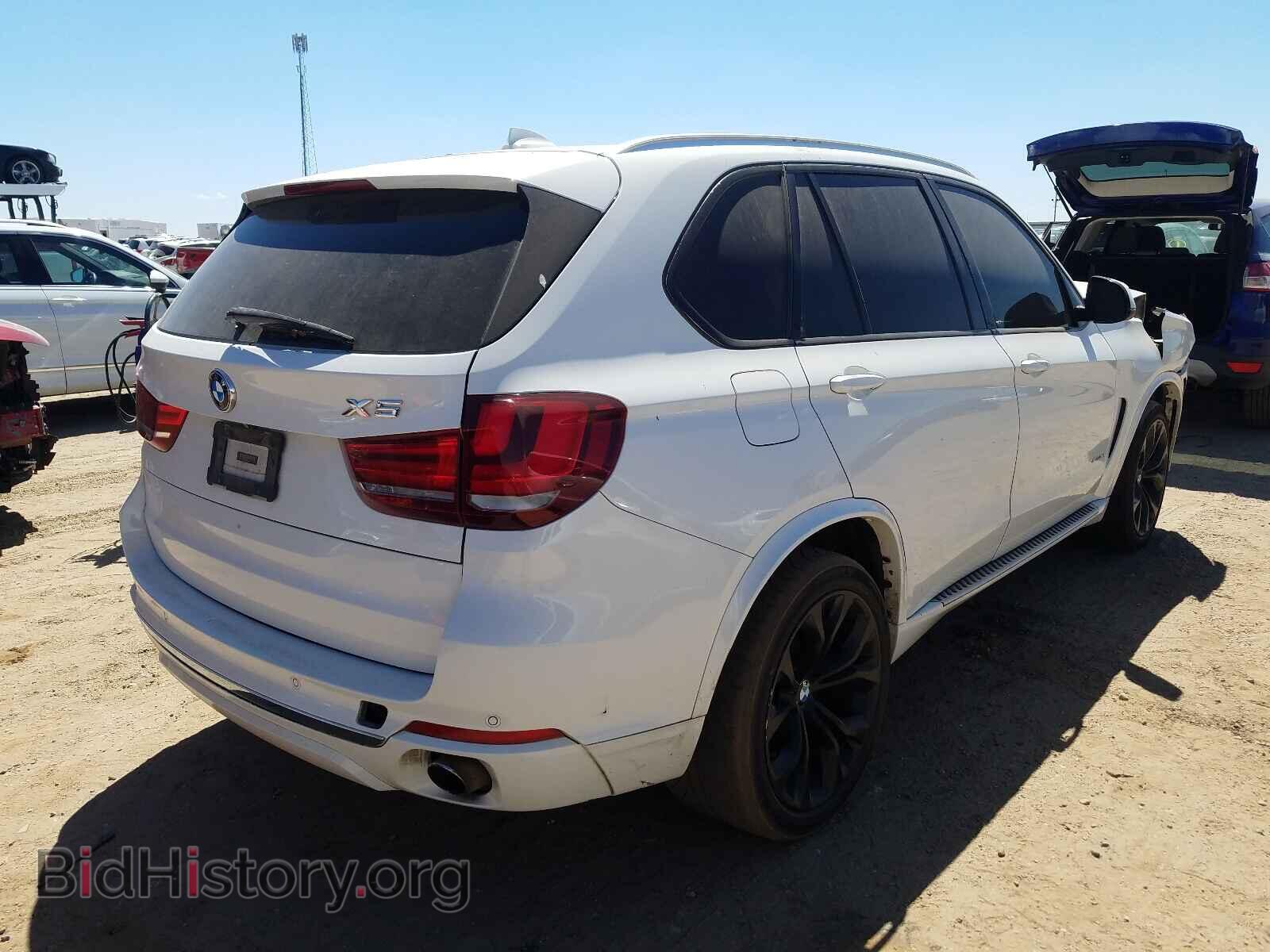 2014 BMW X5 - VIN: 5UXKR2C59E0C01907 - Фото 4