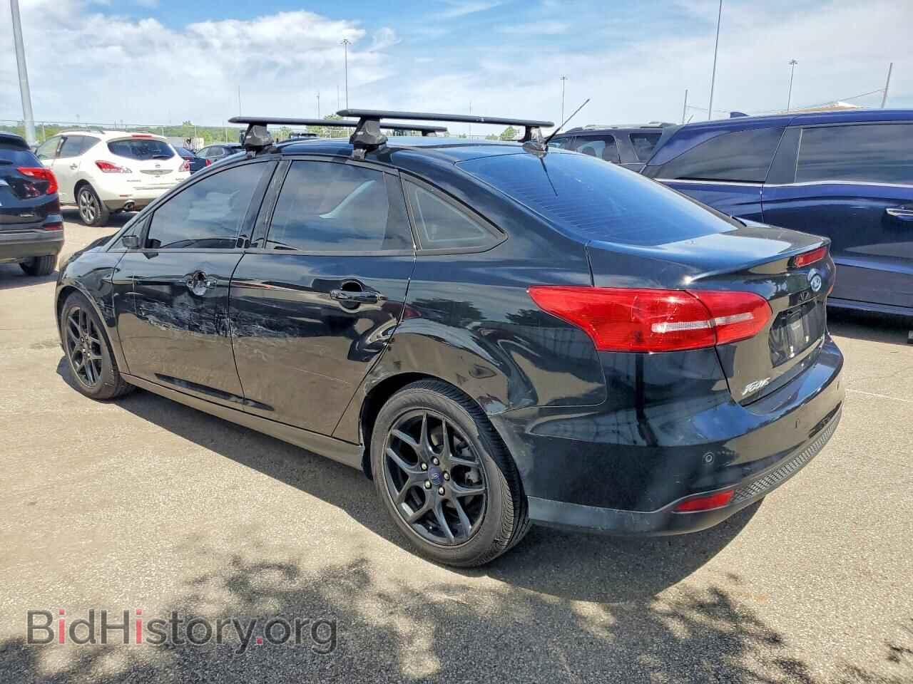 2016 FORD FOCUS - VIN: 1FADP3F27GL404094 - Photo 2