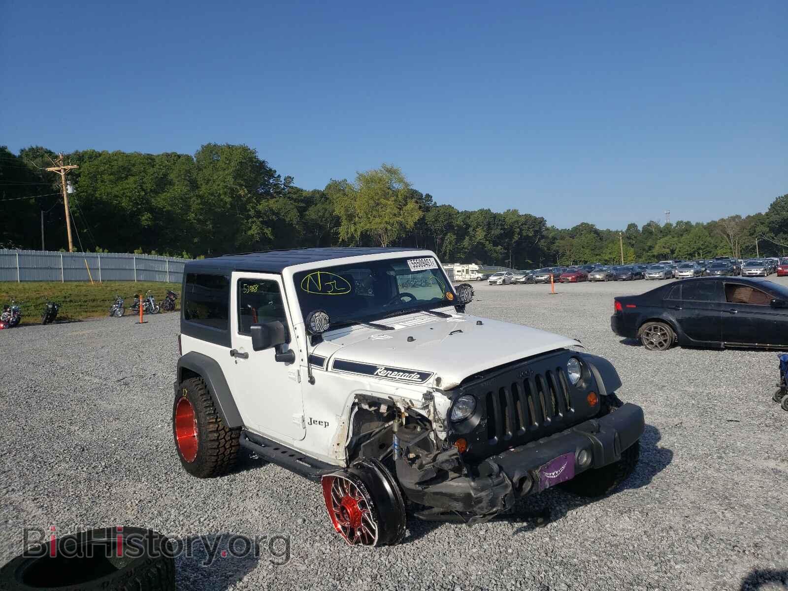Photo 1J4AA2D12BL556127 - JEEP WRANGLER 2011