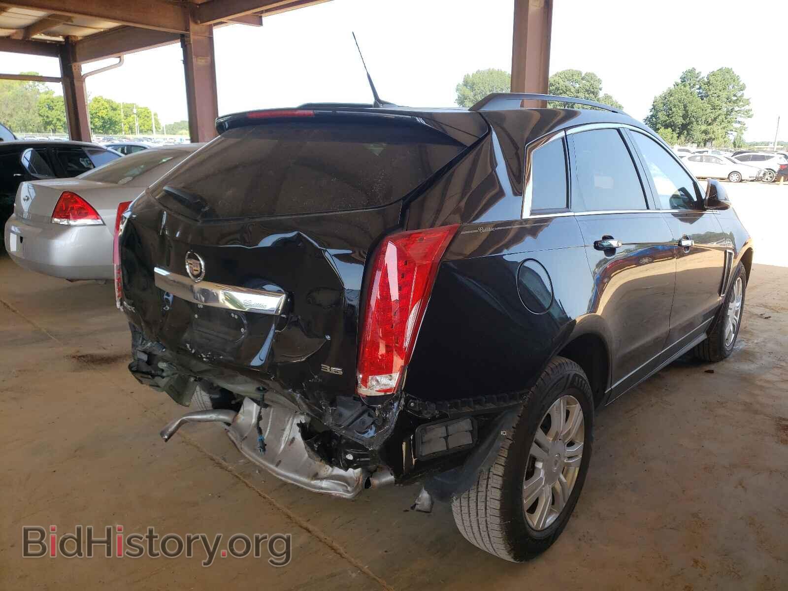2014 CADILLAC SRX - VIN: 3GYFNAE33ES660273 - Фото 4