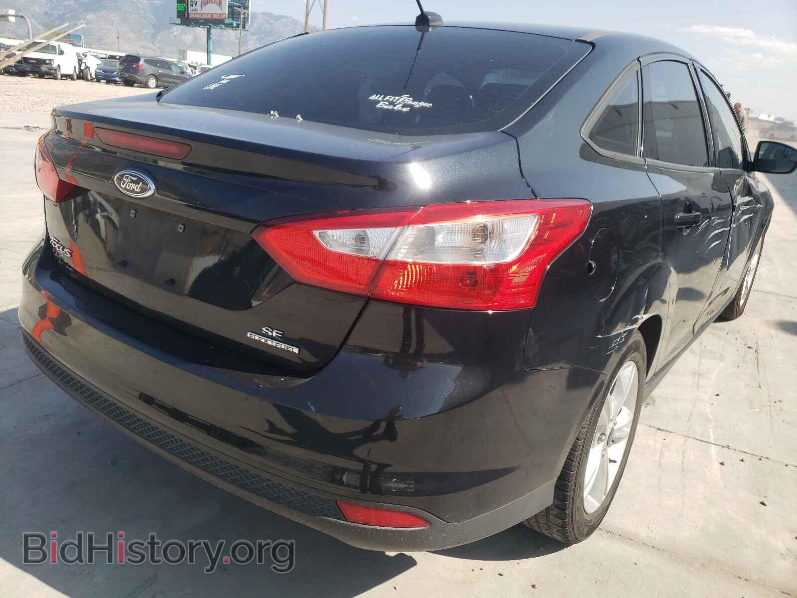 2014 FORD FOCUS - VIN: 1FADP3F2XEL260232 - Photo 4