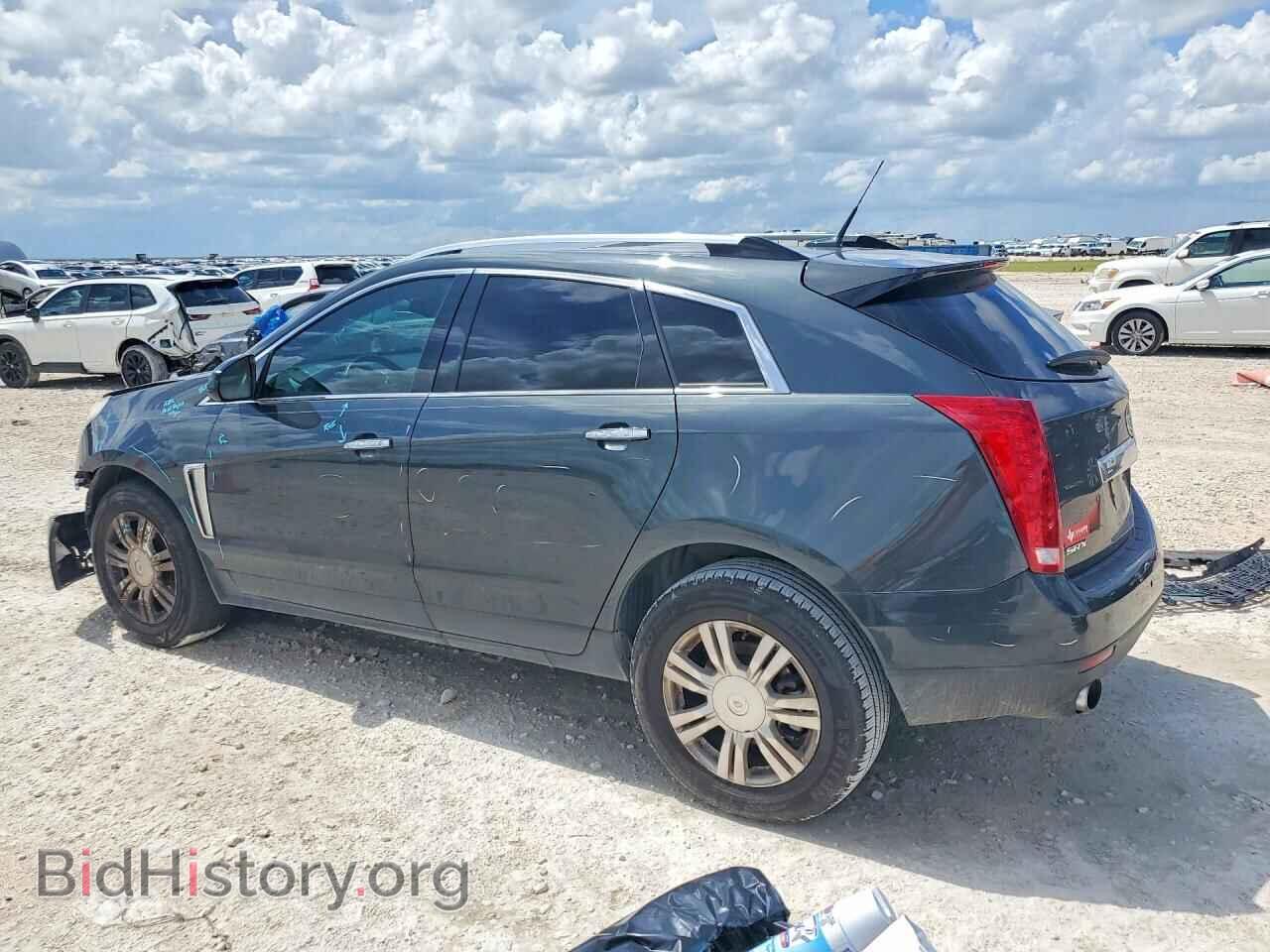 2014 CADILLAC SRX - VIN: 3GYFNBE37ES566886 - Фото 2