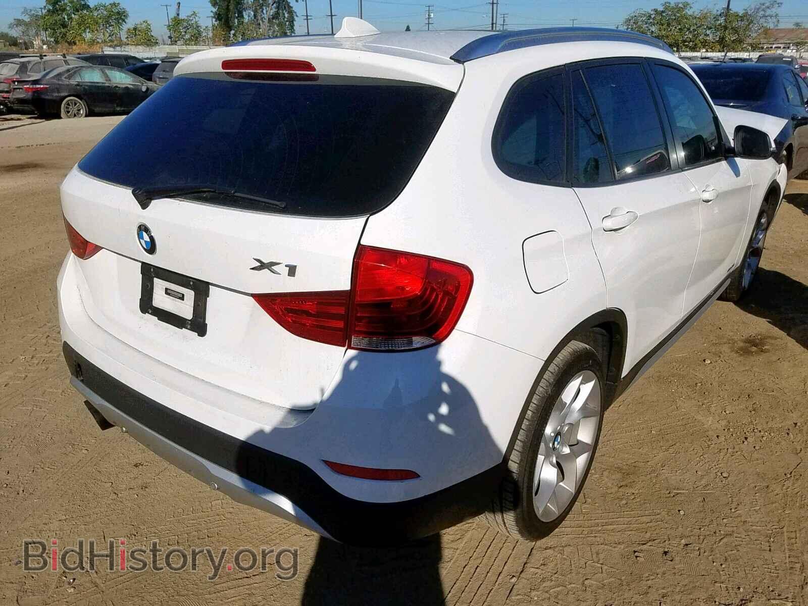 2014 BMW X1 - VIN: WBAVM5C55EVV92517 - Фото 4