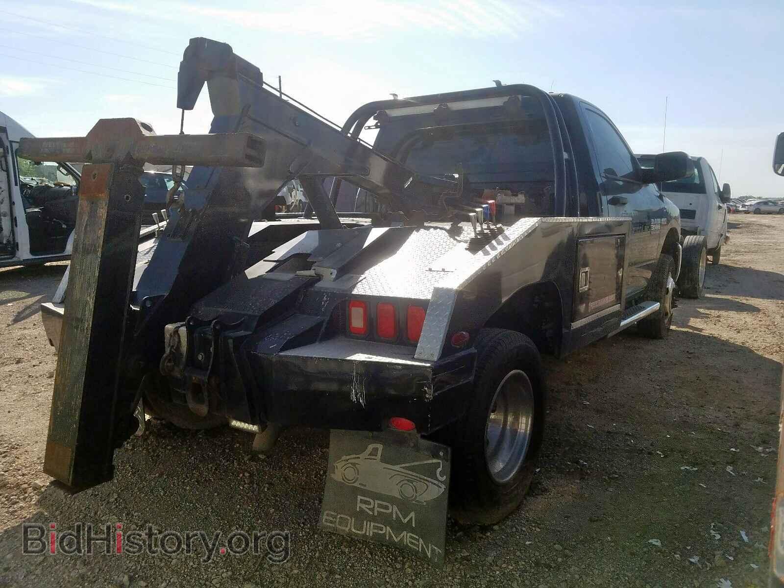 2014 RAM 3500 - VIN: 3C7WRSAJ2EG298799 - Фото 4