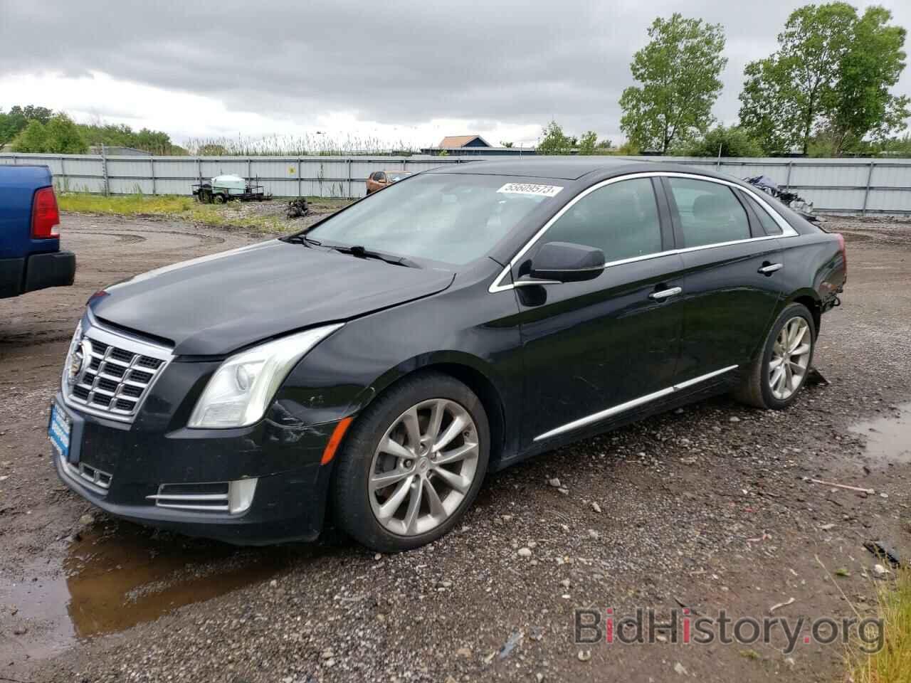 Report 2G61N5S37E9283734 CADILLAC XTS 2014 BLACK GAS price and damage