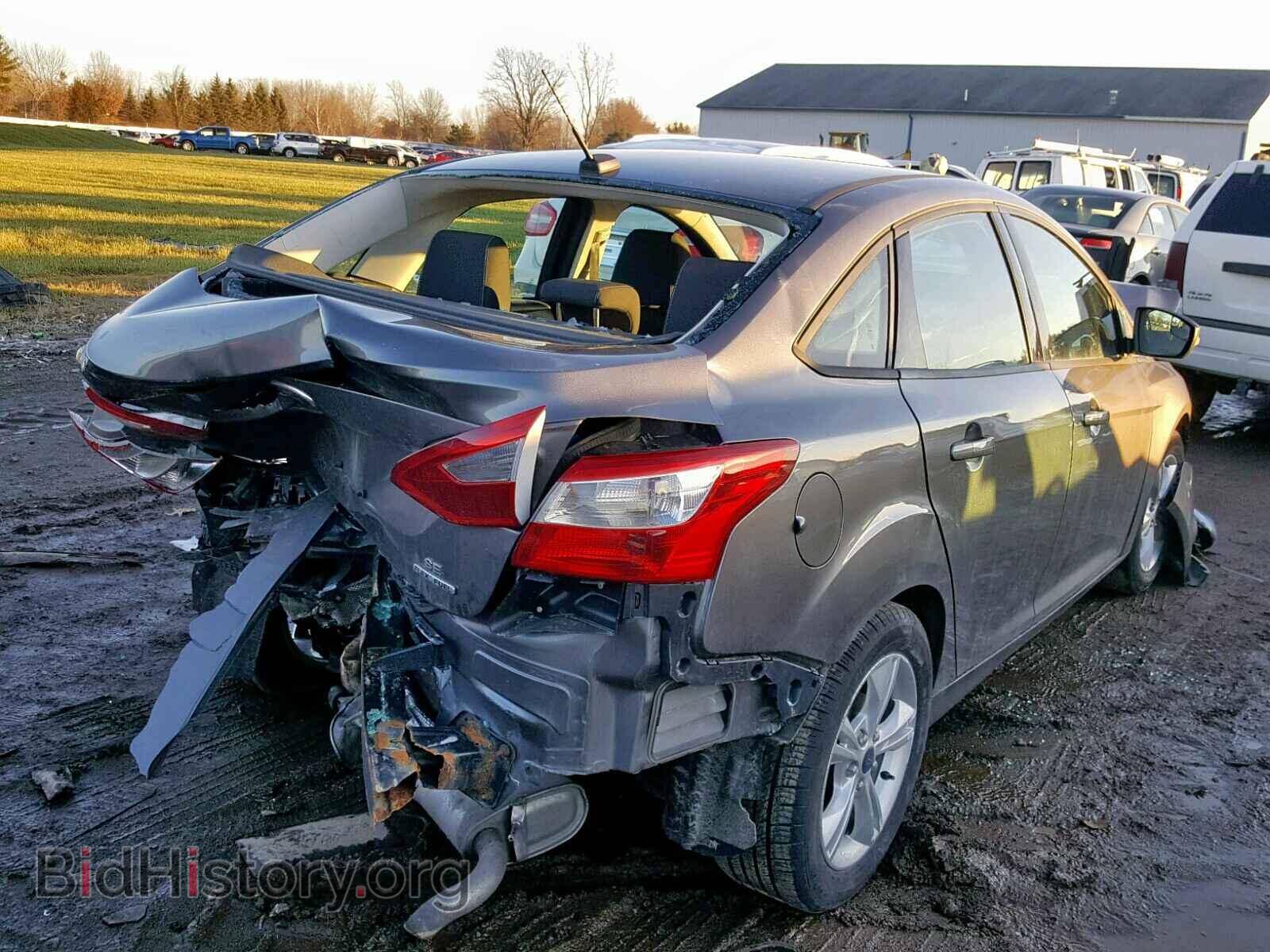 2014 FORD FOCUS - VIN: 1FADP3F20EL310409 - Photo 4