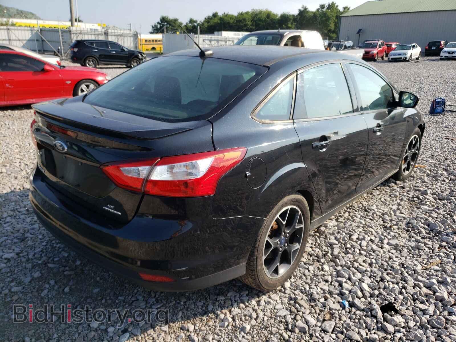 2014 FORD FOCUS - VIN: 1FADP3F26EL202750 - Photo 4