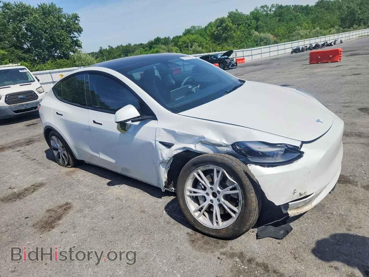 2023 TESLA MODEL Y - VIN: 7SAYGAEE9PF673330 - Photo 4
