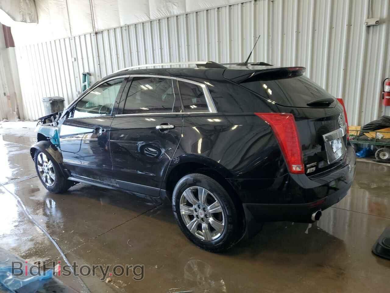 2014 CADILLAC SRX - VIN: 3GYFNBE3XES574352 - Фото 2