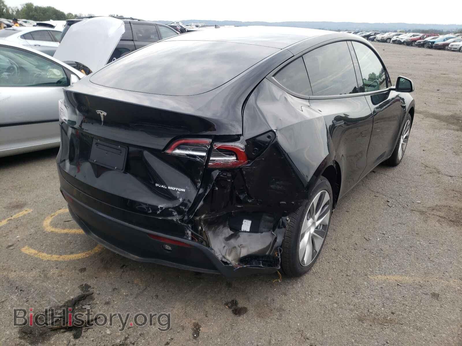 2021 TESLA MODEL Y - VIN: 5YJYGAEEXMF199347 - Фото 4