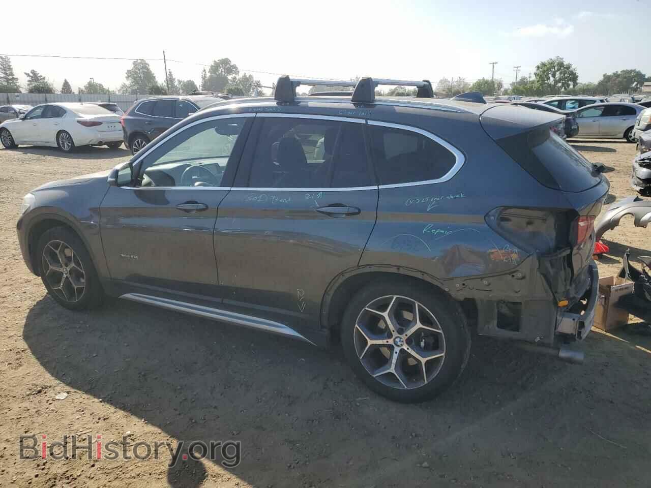 2017 BMW X1 - VIN: WBXHT3C32H5F85699 - Фото 2
