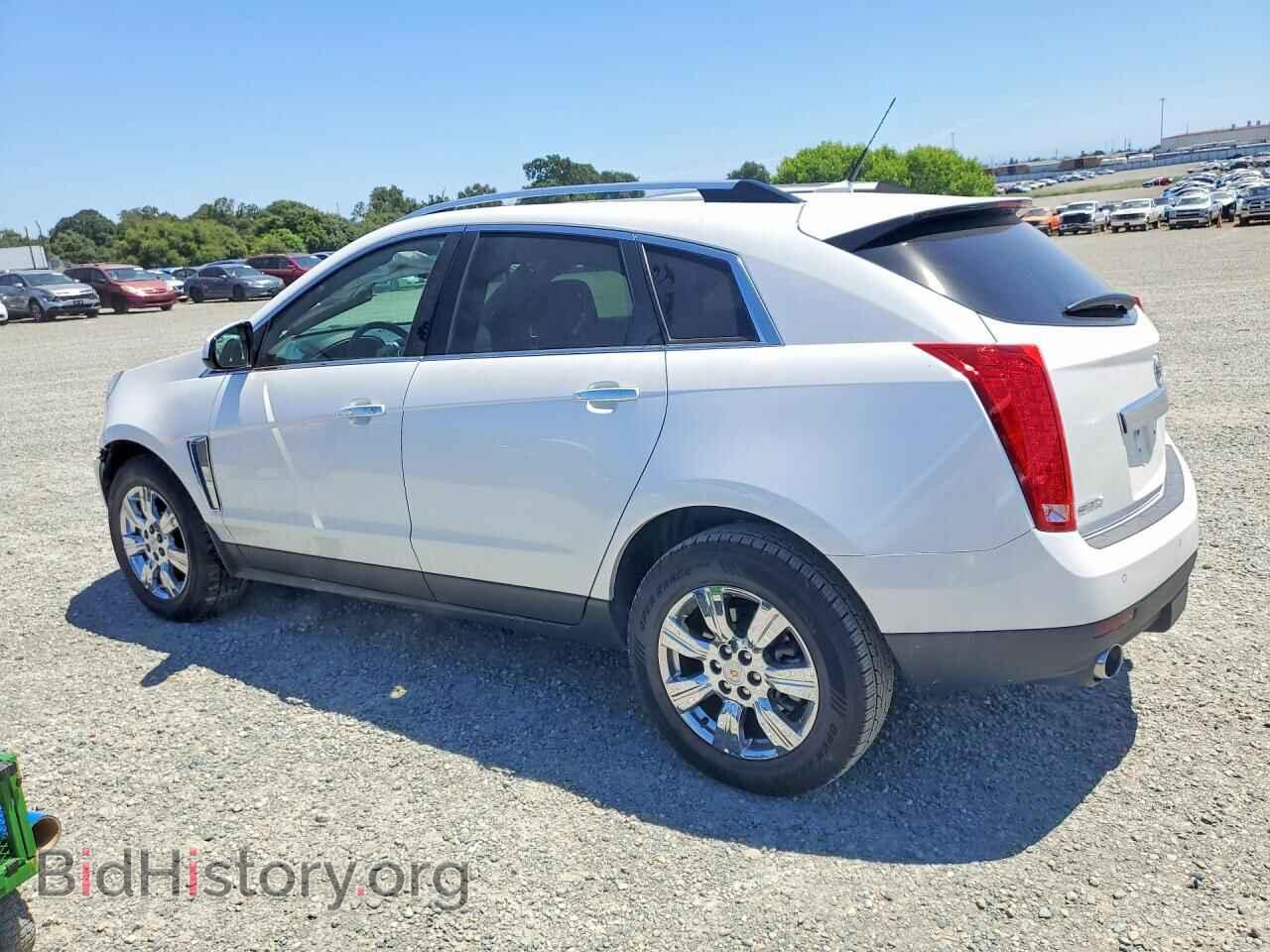 2014 CADILLAC SRX - VIN: 3GYFNBE31ES687249 - Фото 2