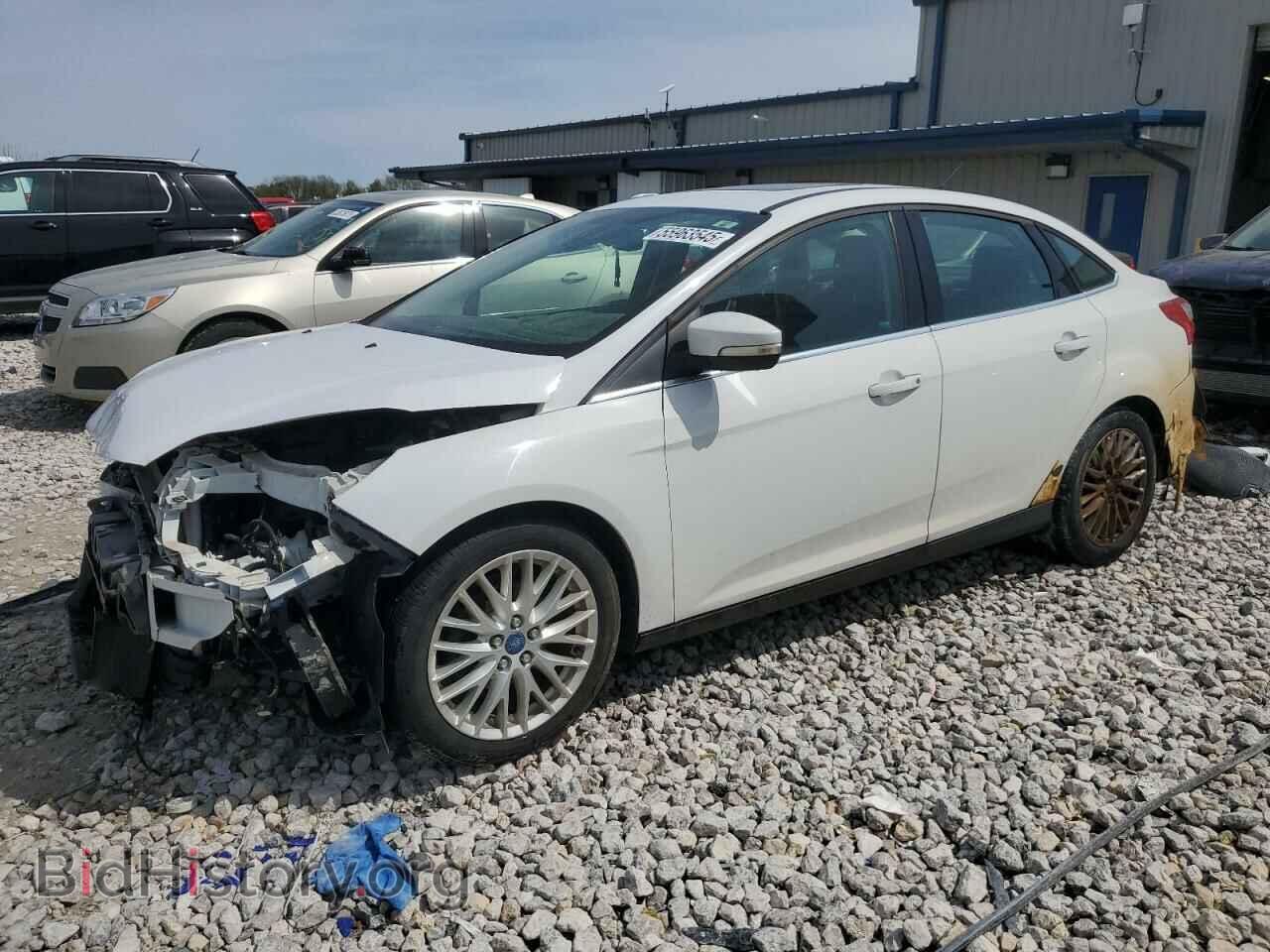 Фотография 1FAHP3H27CL234599 - FORD FOCUS 2012