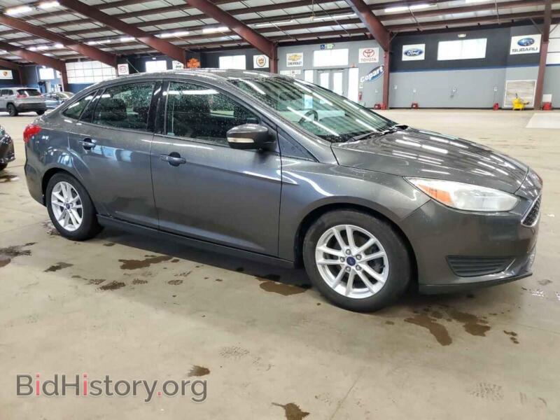 2015 Ford FOCUS (VIN 1FADP3F21FL307908) — фото 4 из 12
