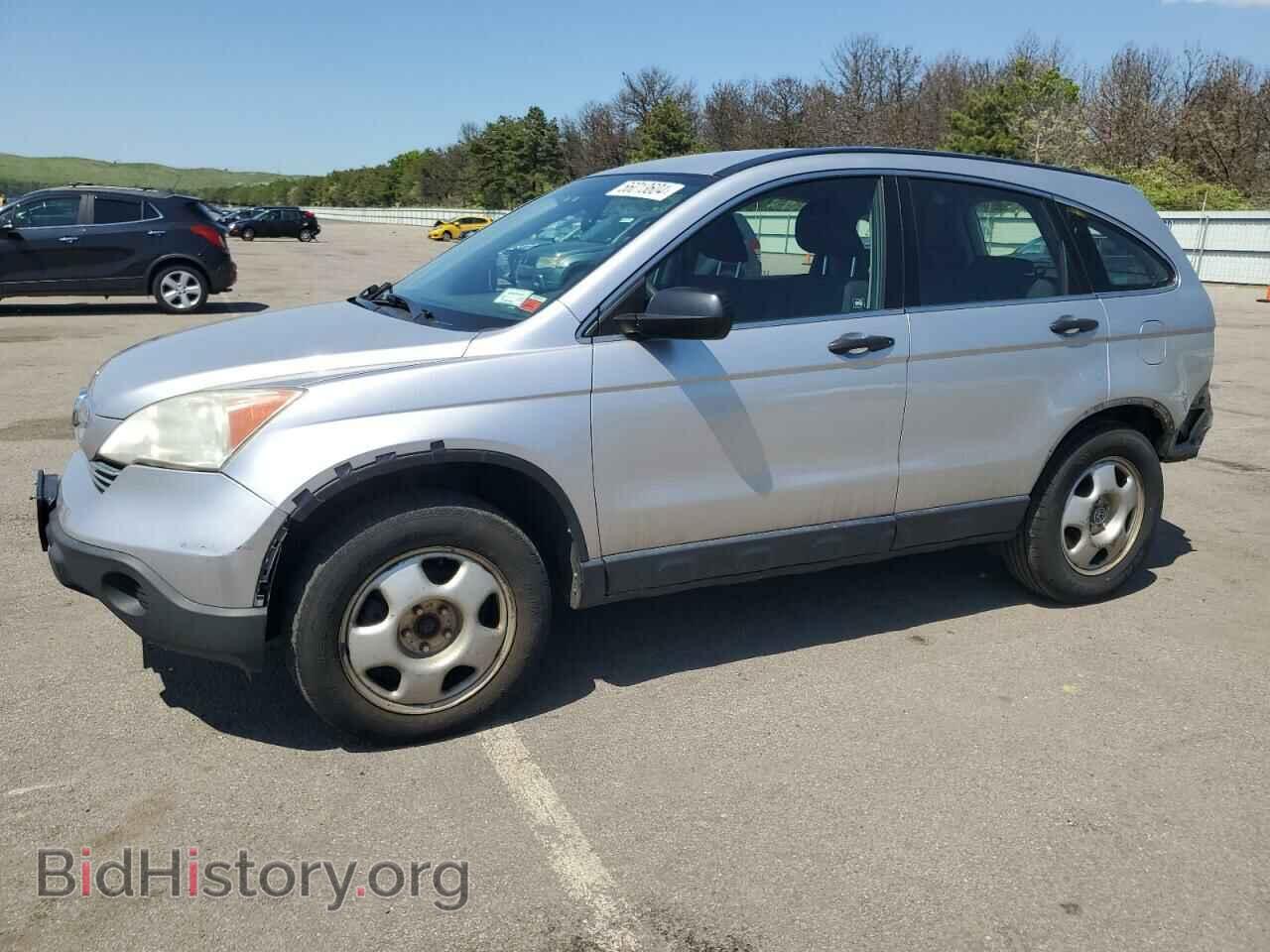 Photo JHLRE48329C016424 - HONDA CRV 2009