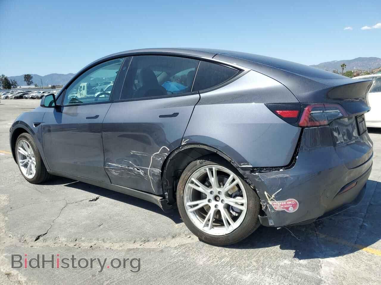 2023 TESLA MODEL Y - VIN: 7SAYGDEEXPF889351 - Фото 2