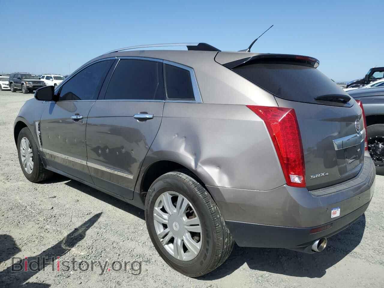 2012 CADILLAC SRX - VIN: 3GYFNDE39CS575551 - Фото 2
