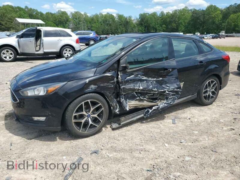 2017 Ford FOCUS SEL (VIN 1FADP3H21HL272142) — фото 1 из 14, Copart, повреждение: бок