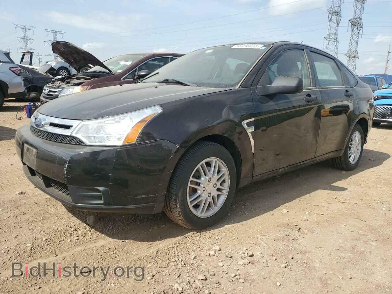 Фотография 1FAHP35NX8W215744 - FORD FOCUS 2008