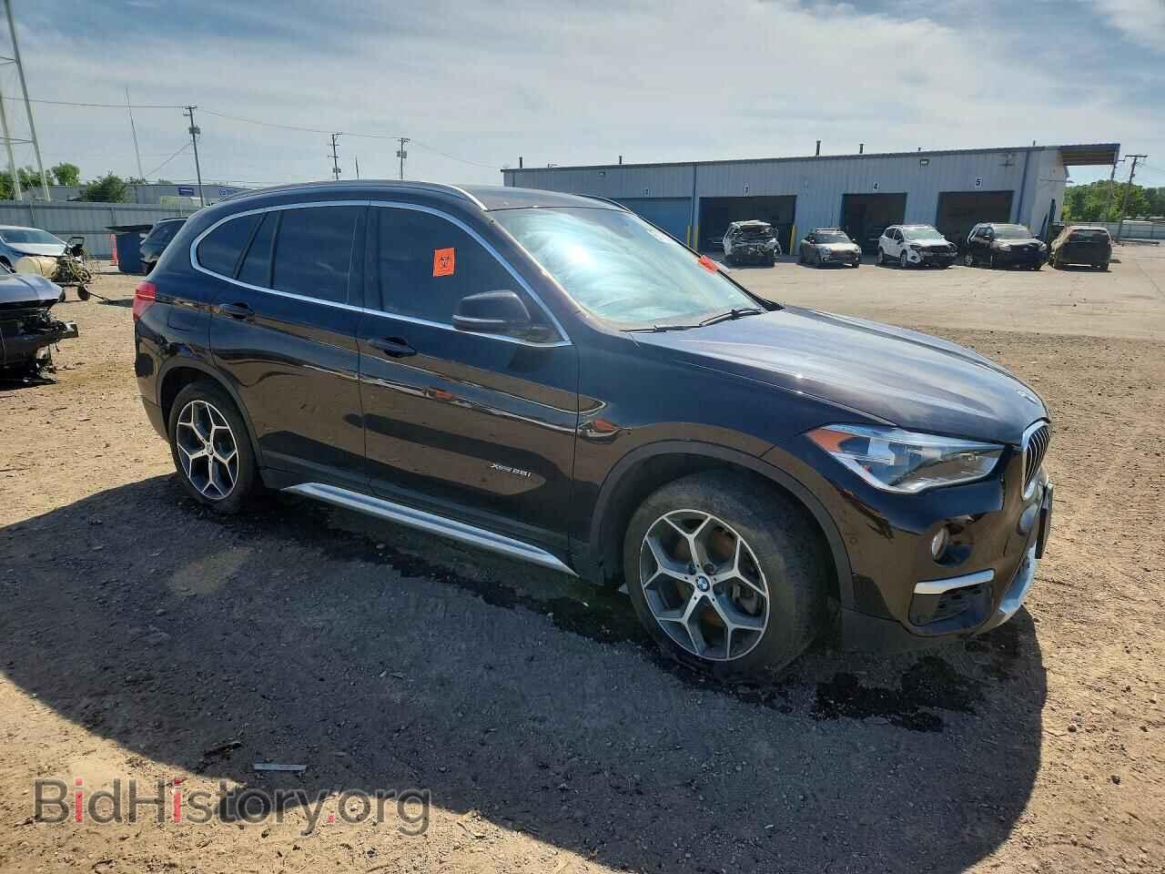 2017 BMW X1 - VIN: WBXHT3C32H5F70751 - Photo 4