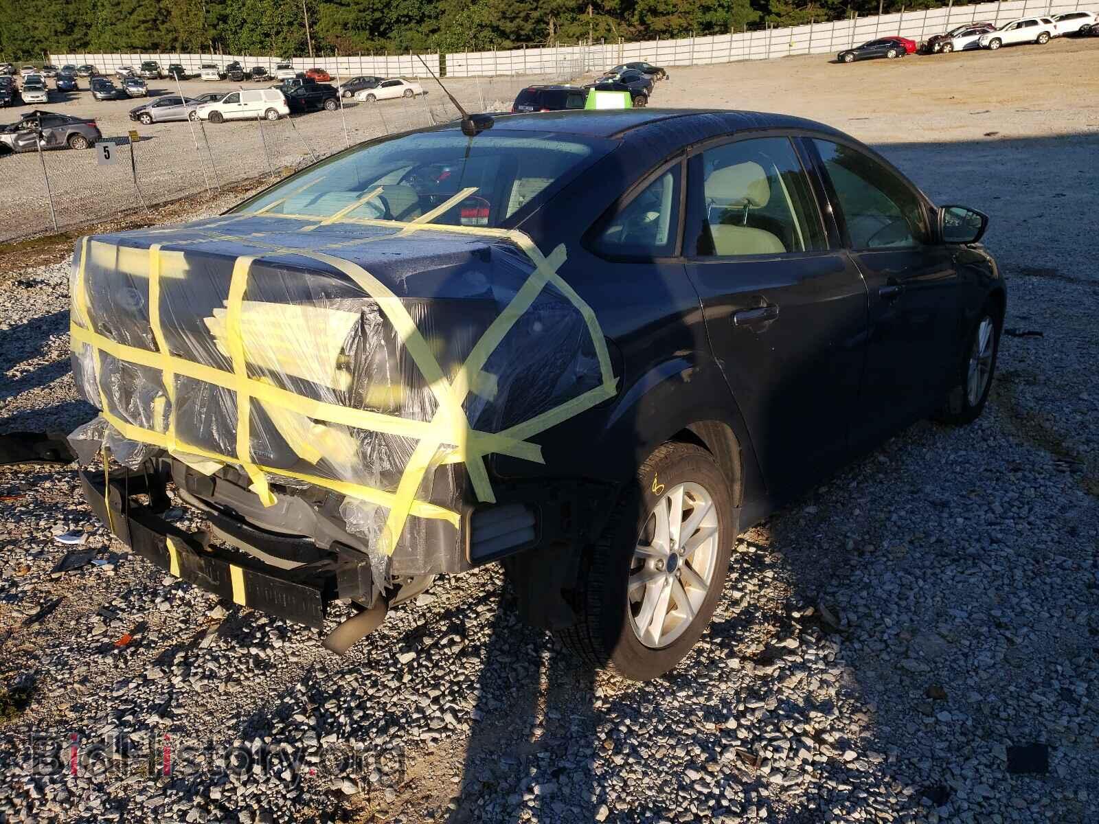 2015 FORD FOCUS - VIN: 1FADP3F22FL291783 - Photo 4