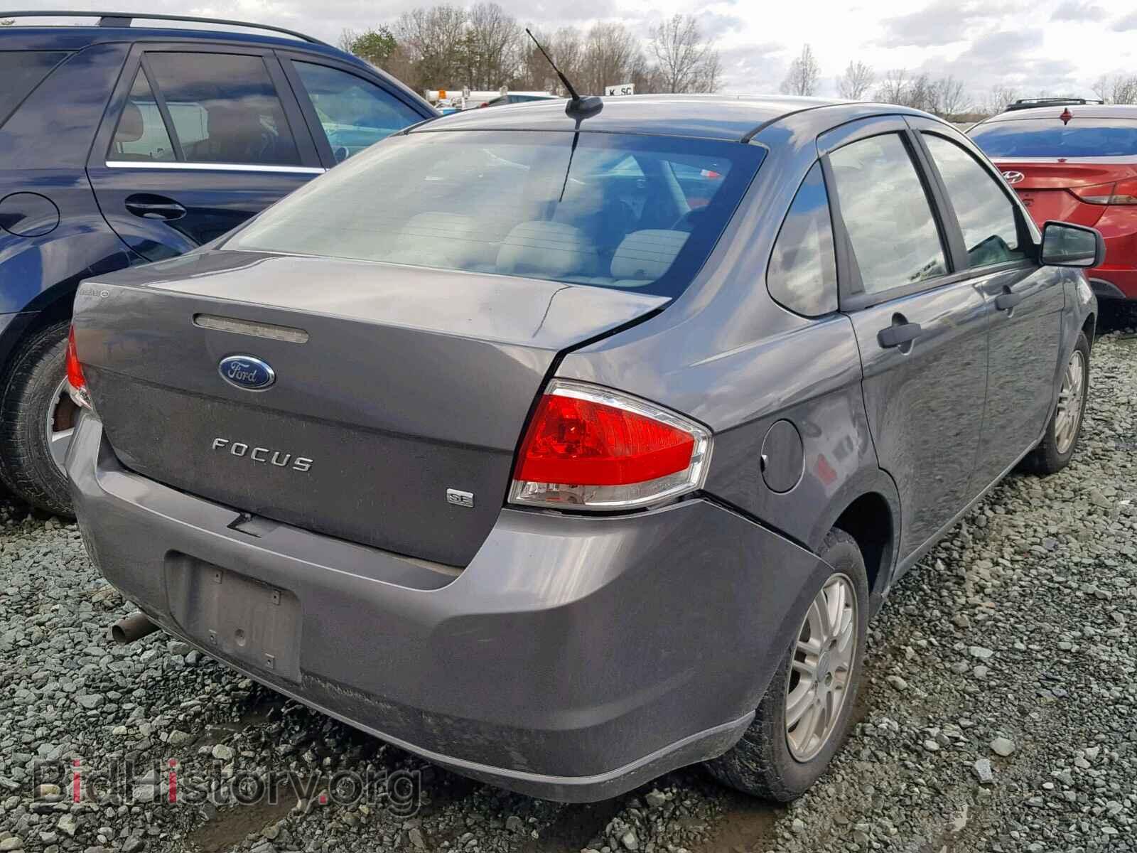 2011 FORD FOCUS - VIN: 1FAHP3FN6BW158447 - Photo 4
